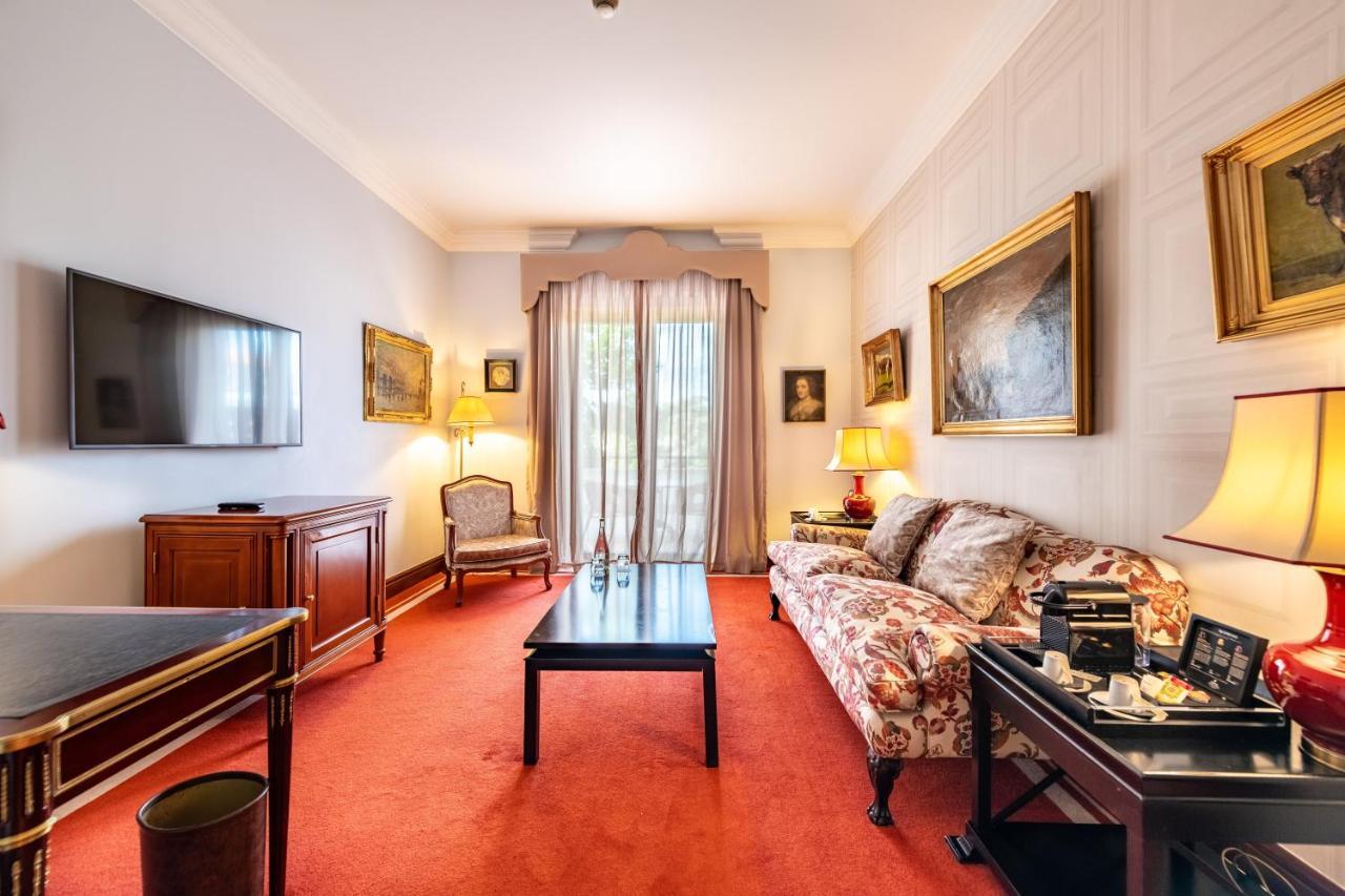 Pestana Palace Lisboa Hotel & National Monument - The Leading Hotels Of The World Exterior foto A living room at the hotel